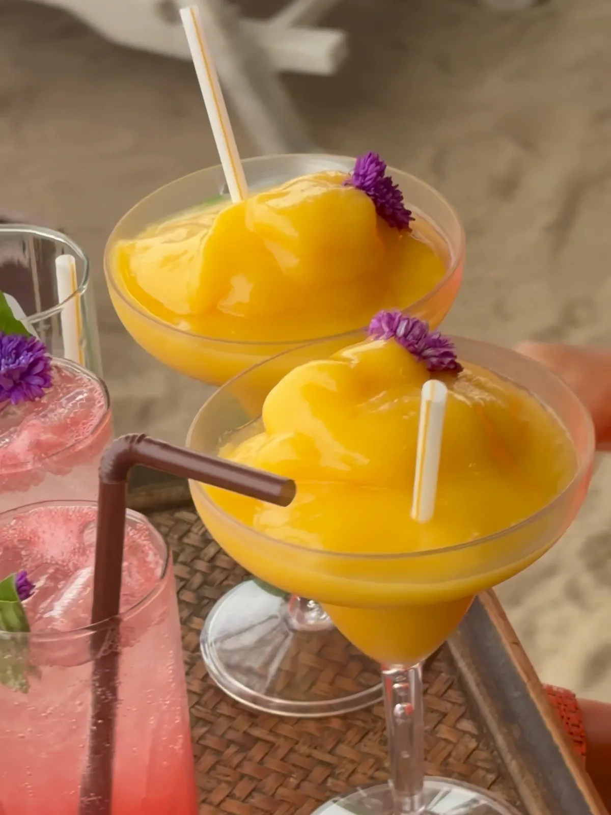 Frozen mango cocktails served on the beach at Brio